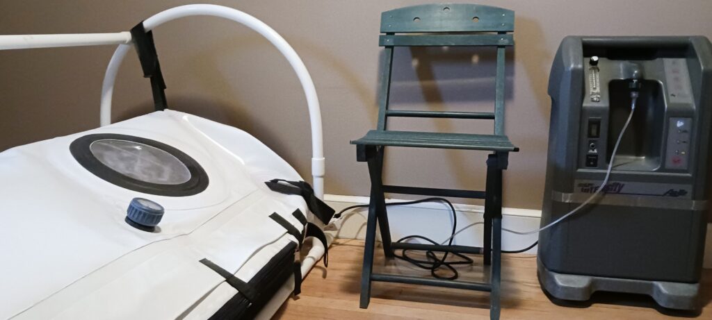 an oxygen concentrator and hyperbaric chamber